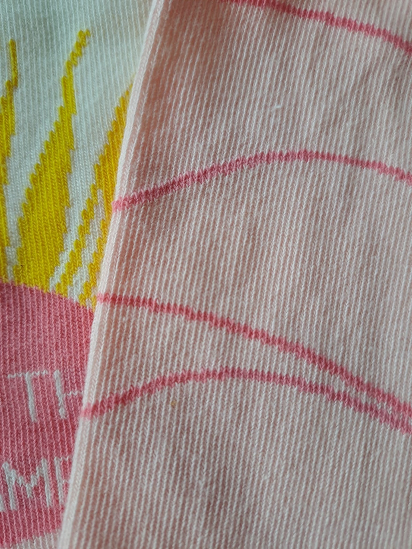 Close-up of Belong Mode socks showing the fabric texture and design details
