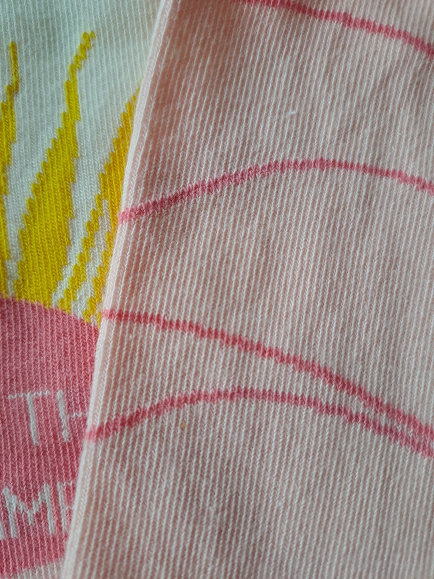 Close-up of Belong Mode socks showing the fabric texture and design details